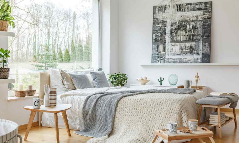 Floating Shelf Above a Grey Bed